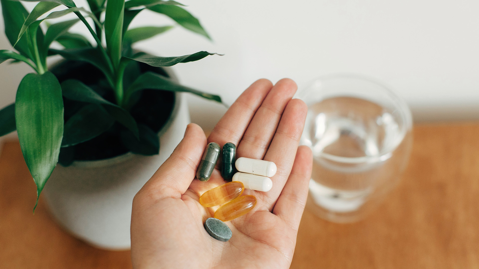 Palm holding few different pills